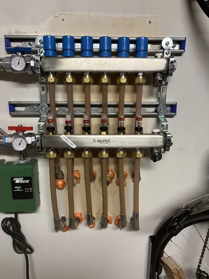 Plumber performing Water Heater Repair at a residential property in Oracle